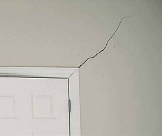 Crack in plaster over door - We can fix that